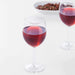 A clear glass wine glass from IKEA, perfect for any occasion.