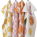 made of a high-quality cotton material, featuring a bold and vibrant pattern and a loop for hanging.704.930.46