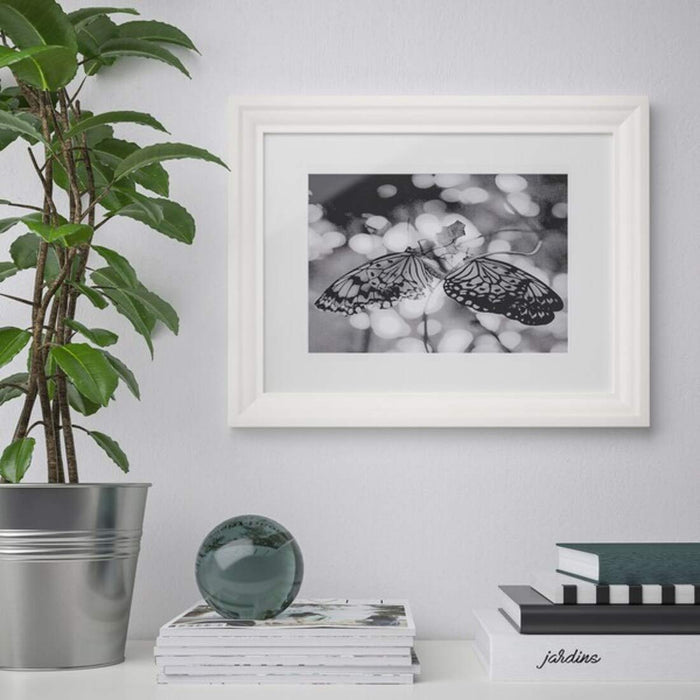 A photo displayed in a white IKEA frame, 30x40 cm, showcasing the frame's affordability and stylish design00427291