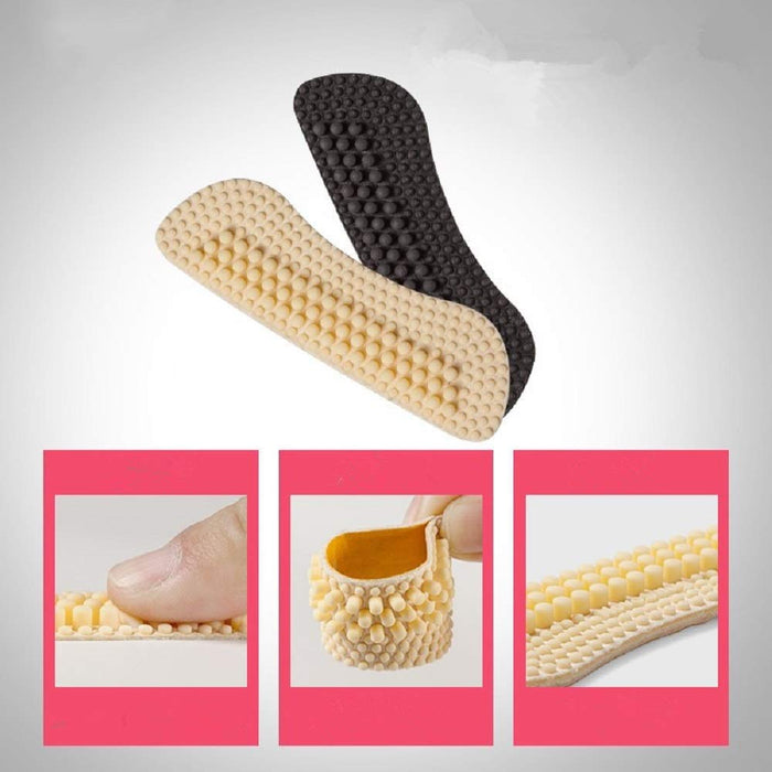 A pair of Heel Liner Grip Pad Cushions with a cushioned texture.
