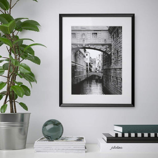 A modern photo frame with a minimalist design, ideal for showcasing your art or photography30387137
