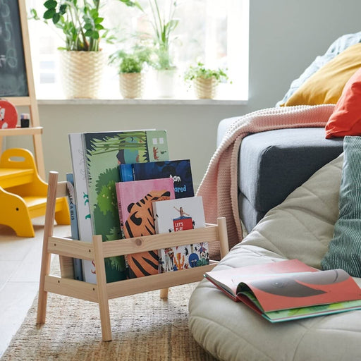 A classic book display in a warm natural wood finish with five open shelves, from IKEA.