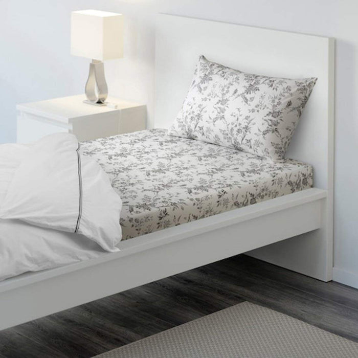 White-grey cotton flat sheet and pillowcase from IKEA on a bed 80418725