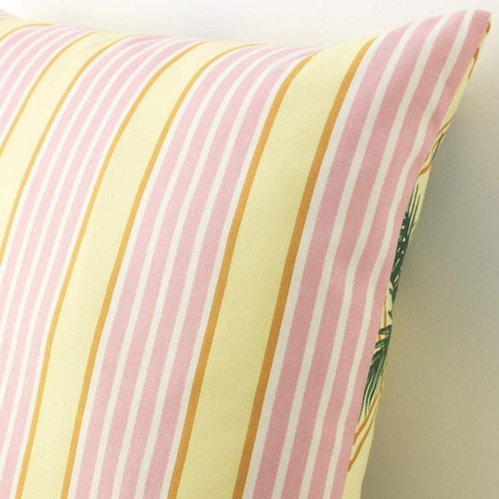 A close-up of an IKEA cushion cover in a textured light yellow & Multicolours fabric, featuring a subtle pattern of light and dark woven threads. 10467578