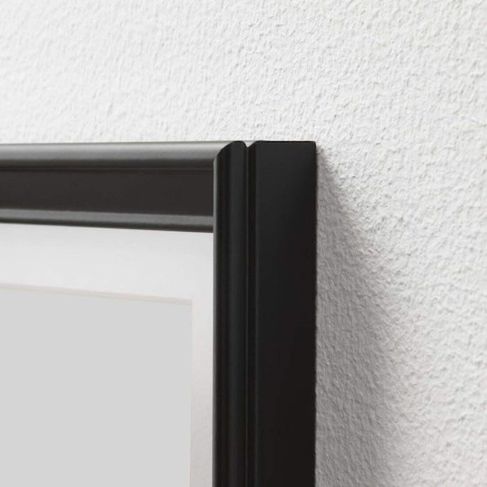 Create a stylish photo display with an affordable and chic black 30x40cm photo frame from IKEA 10387119