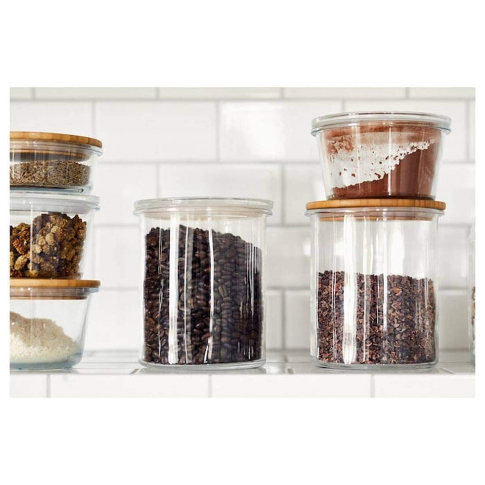 A round glass jar lid designed for use with IKEA storage containers, providing a secure seal to keep food fresh and organized 10393498