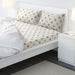 White cotton flat sheet and 2 pillowcase set from IKEA on a bed50482001