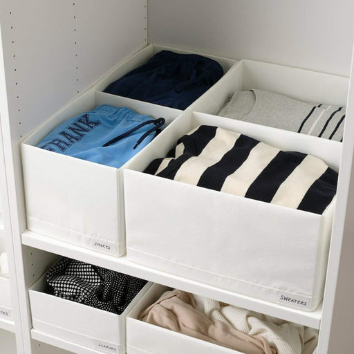 A box with compartments designed for storing clothes such as sweaters at the end side of the box you can write the name also as you wish 10474437