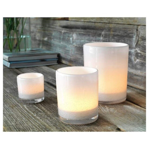 Add a touch of warmth and elegance to your home with IKEA candle holders.  50412391