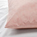 The edge of a pink pillowcase from IKEA, highlighting its bright and cheerful color 30501623