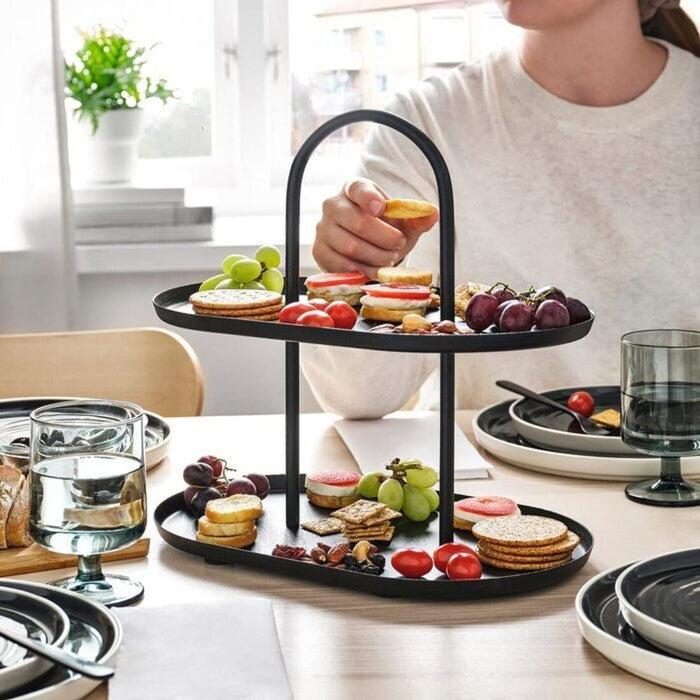 Digital Shoppy IKEA Serving stand, two tiers, blackfor decoration, Kitchenware & tableware, Serveware, Cake & serving stands. dinnerware, home- 30539522, An IKEA serving stand with two tiers, both painted black. The top tier is smaller than the bottom tier and the stand is made of metal. 