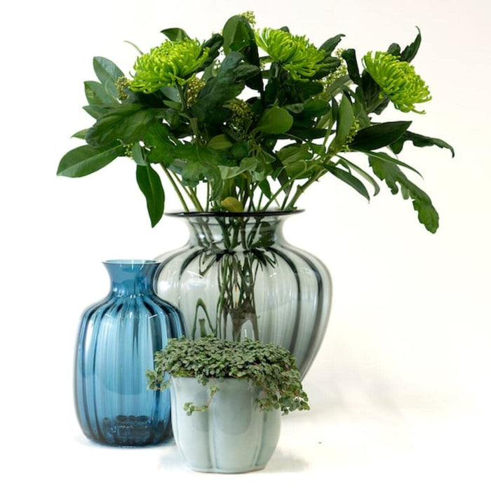 Blue ceramic plant vase from IKEA with a sleek and modern design, perfect for displaying indoor plants or flowers. 10442192