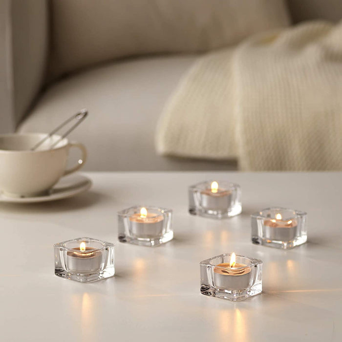  IKEA scented tealight candle in a clear glass holder, showcasing the natural soy wax and essential oil blend.