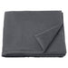 An anthracite bath towel from the Ikea 6 Piece Combo Set, draped over a white bathtub.
