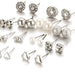 A set of 12 pairs of white crystal charm stud earrings for women.