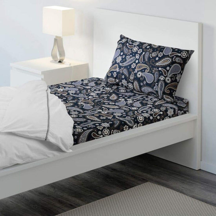 Blue Cotton flat sheet and pillowcase from IKEA on a bed 50418756