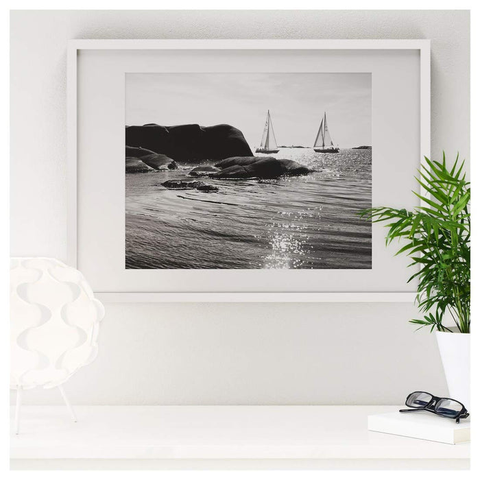 Minimalistic and chic 30x40 cm IKEA frame in white, adds a touch of elegance to any decor 60378424