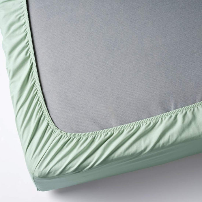 A closeup image of IKEA sheet fits over the corners of your mattress and stays in place thanks to the elastic edging-50459736
