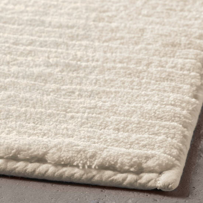 Thick and luxurious blue bath mat from IKEA, with a plush texture that provides comfort and warmth to your feet after a shower or bath 70500141