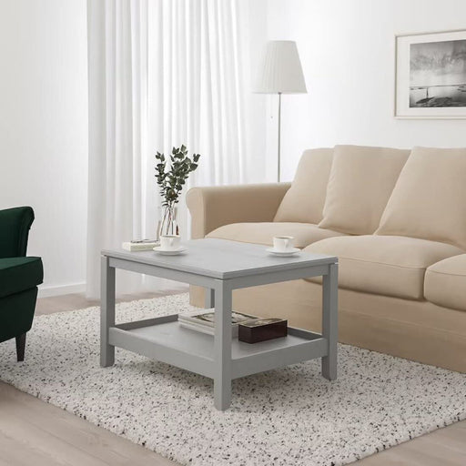 A rectangular wooden coffee table with a sleek and modern design from IKEA.