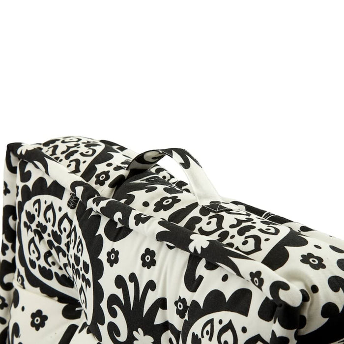 A black floor cushion from IKEA, ideal for a minimalist interior. 00415844, 90540221,10540220, 70540222 