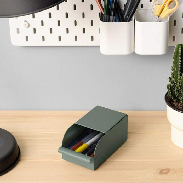 Versatile grey-green metal box for home, office, or workshop use