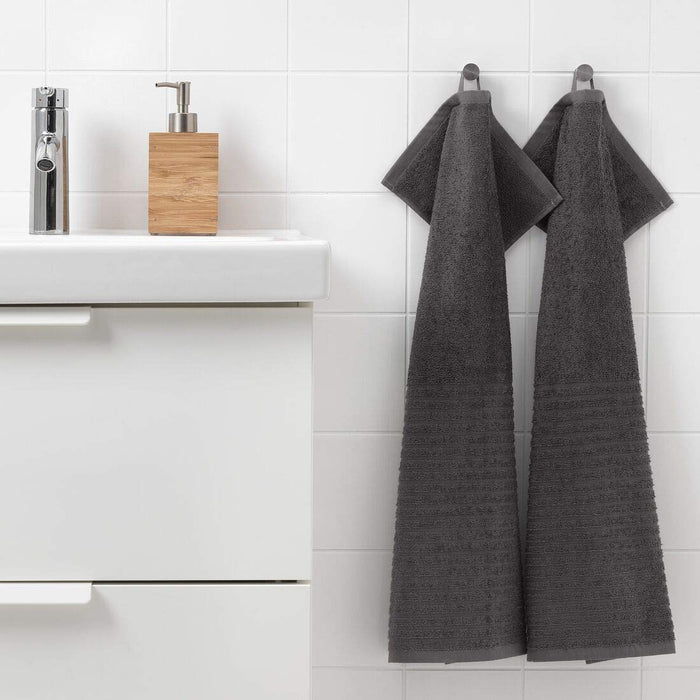 An image of a Dark Grey hand towel hanging from a hook on a bathroom wall 20353618
