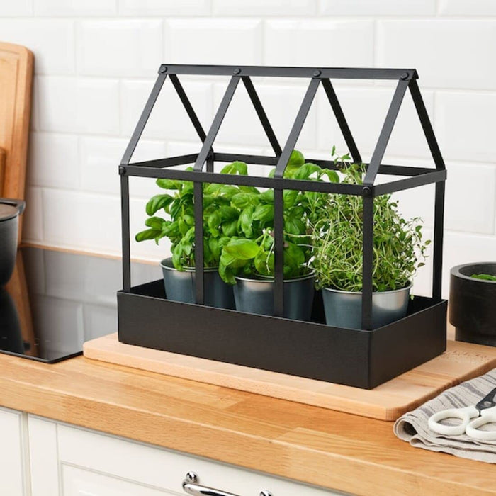 The IKEA Greenhouse Decoration adds a touch of nature to any space, perfect for plant lovers.