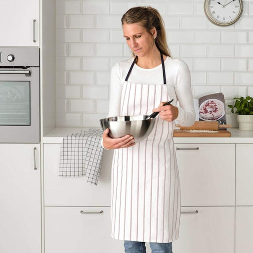 Add some personality to your cooking attire with this fun and trendy apron from IKEA, perfect for any home cook or baking enthusiast 60484047