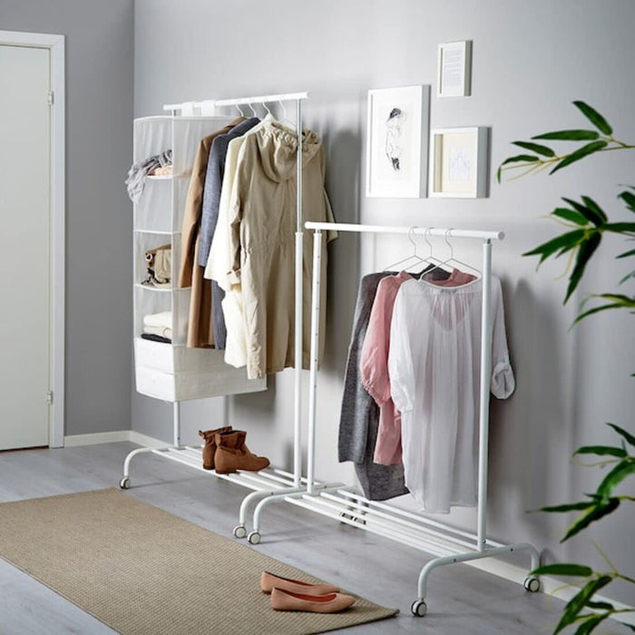 A multi-functional clothes rack that can be used for both storage and display purposes, with shelves and hanging bars."