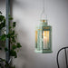 Hanging IKEA Lantern - A lantern with a chain for hanging, made of metal with glass panels.60483547