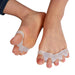 A foot wearing gel toe separators and Achilles stretchers, showing how the devices fit snugly around the toes and Achilles tendon.