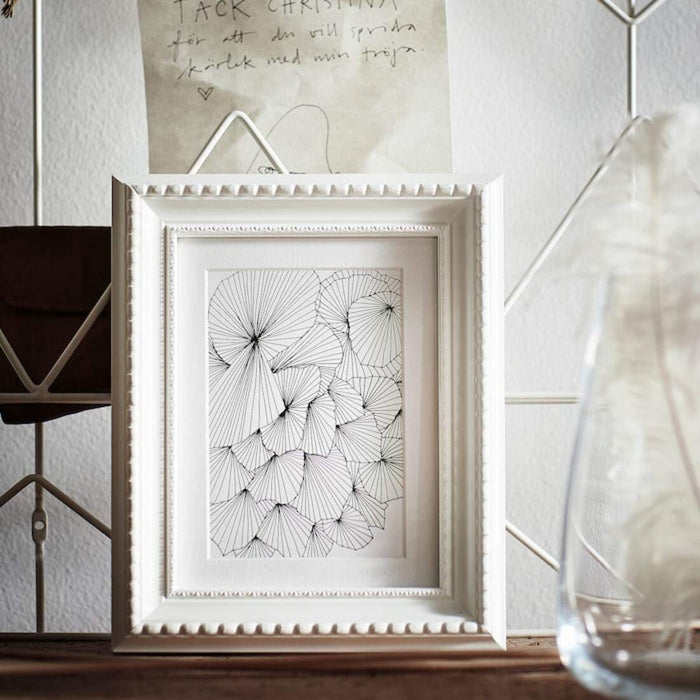 Display your cherished memories with the IKEA White Frame 10466833