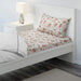 White cotton flat sheet and pillowcase from IKEA on a bed 60494310