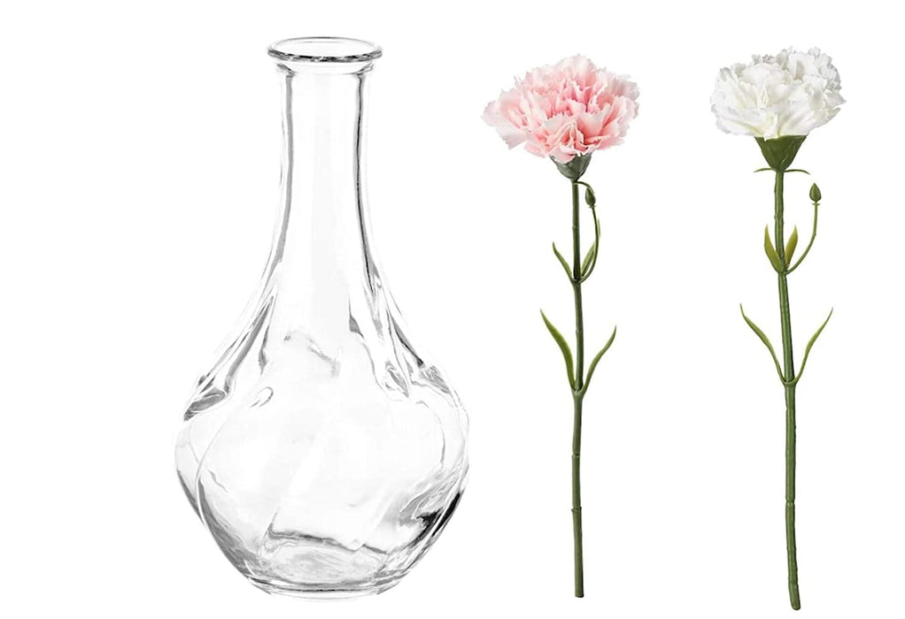 "A clear glass vase with a geometric pattern and a modern design"