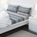 Blue and white cotton flat sheet and 2 pillowcase set from IKEA on a bed  40493887