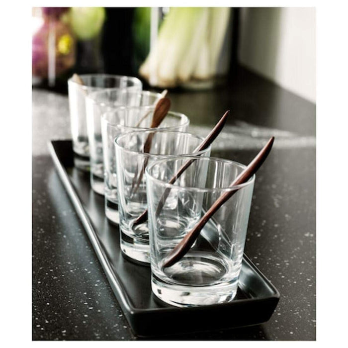 A clear glass vase with a unique, asymmetrical design, perfect for adding a touch of modern elegance to your home decor.