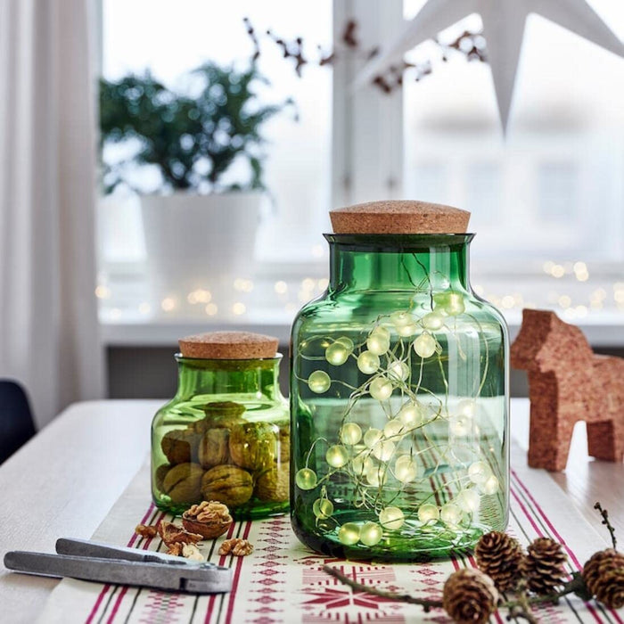 Digital Shoppy IKEA Jar with lid, green/cork, 2.5 l., price, online, storage glass ware,  The IKEA jar with lid in green and cork, standing on a kitchen counter with the lid removed and displaying its 2.5L capacity. 70500787