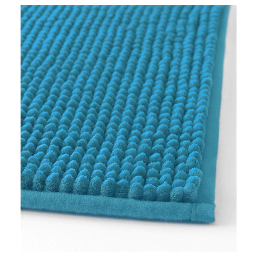 Thick and luxurious turquoise bath mat from IKEA, with a plush texture that provides comfort and warmth to your feet after a shower or bath 20242423