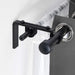 A white curtain rod holder that can be mounted on walls or ceilings for versatile use.