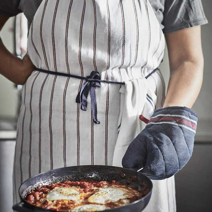 Create a stylish and functional cooking environment with this charming apron from IKEA, featuring a flattering fit and eye-catching design 60484047