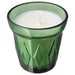 A scented candle in an elegant glass holder, perfect for creating a warm and inviting atmosphere in any room