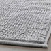 Thick and luxurious grey-white bath mat from IKEA, with a plush texture that provides comfort and warmth to your feet after a shower or bath 70422271