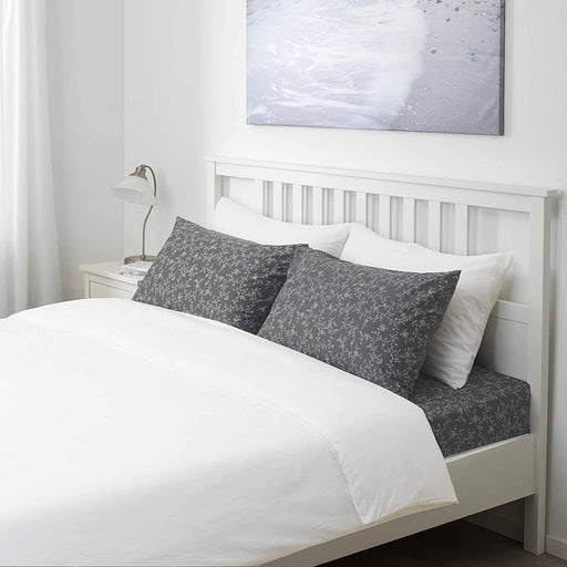 cotton flat sheet and 2 pillowcase set from IKEA on a  bed  40475162