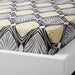 Grey-yellow cotton flat sheet and pillowcase from IKEA draped on a bed 60418731