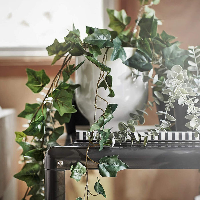 IKEA An artificial hanging ivy potted plant from IKEA, with realistic-looking vines and leaves, measuring 12 cm and designed for both indoor and outdoor use, perfect for adding a natural touch to your decor-10461152