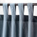 Light blue curtains from IKEA with tie-backs, sold in a set of 2 and measuring 145x150 cm.