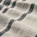 A soft, textured cotton tea towel with a subtle pattern  50479584