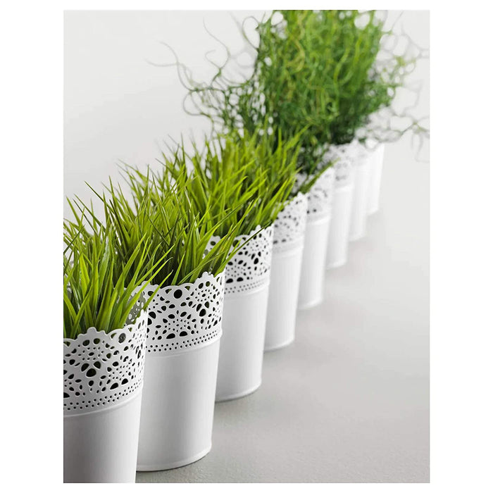 An IKEA plant pot with a smooth finish and a sleek appearance