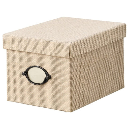 "A beige-colored IKEA box with a hinged lid, suitable for storing small items or as a gift box.